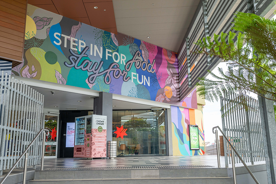 ​​Artists apply the finishing touches to a series of murals at Stockland Rockhampton​